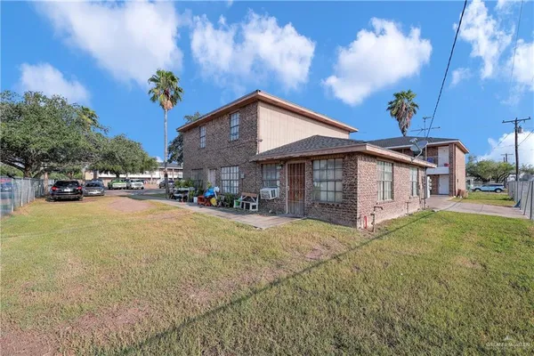 a house view with a garden space
