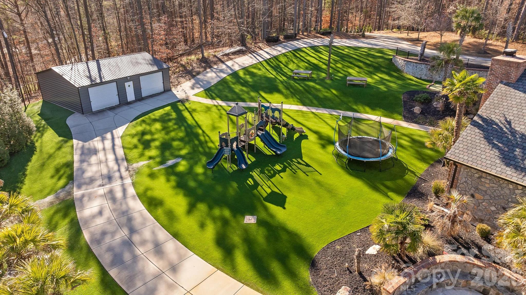 135 Stillwater Road Troutman, NC 28166 - Photo 31 of 43 a view of a swimming pool with a patio
