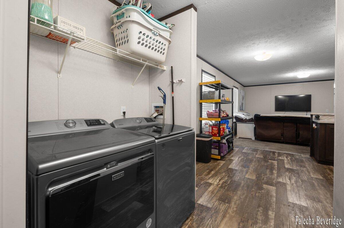 1281 East Pontaluna Road, Unit 101 Spring Lake, MI 49456 - Photo 9 of 18 Laundry Room