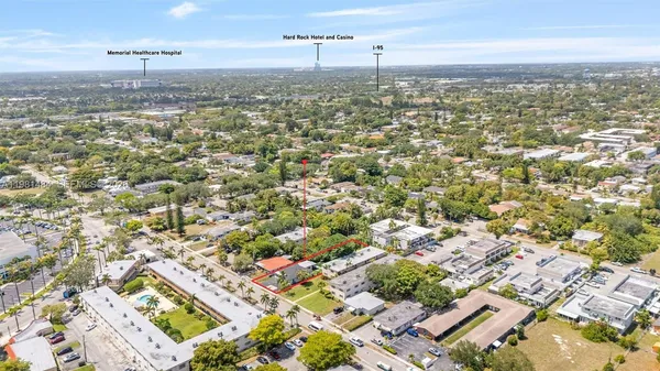 an aerial view of residential building with parking space