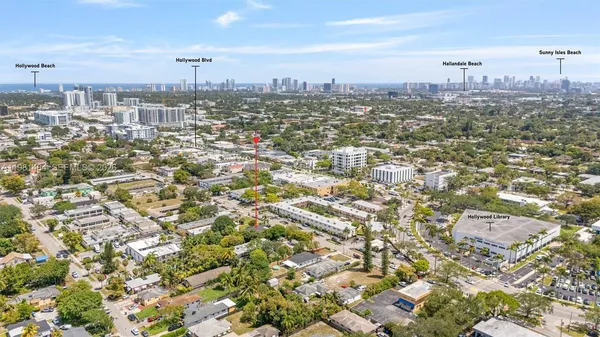 an aerial view of residential building with parking space