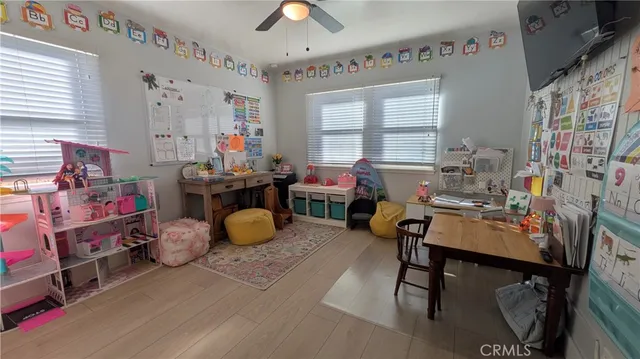 a workspace with furniture and window