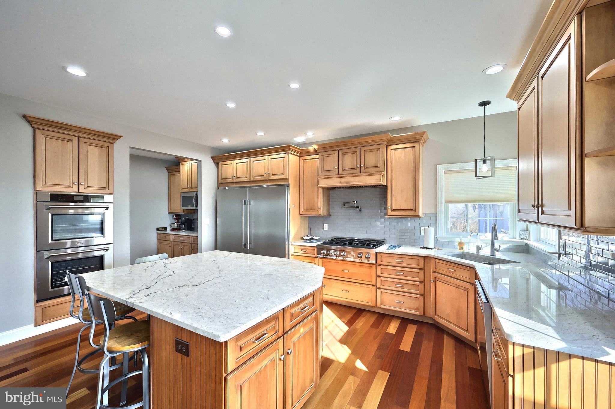 4440 Beards School Road Spring Grove, PA 17362 - Photo 17 of 66 a kitchen with a stove a refrigerator and a sink