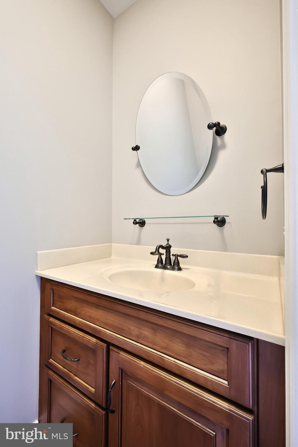 4440 Beards School Road Spring Grove, PA 17362 - Photo 25 of 66 a bathroom with a sink and a mirror