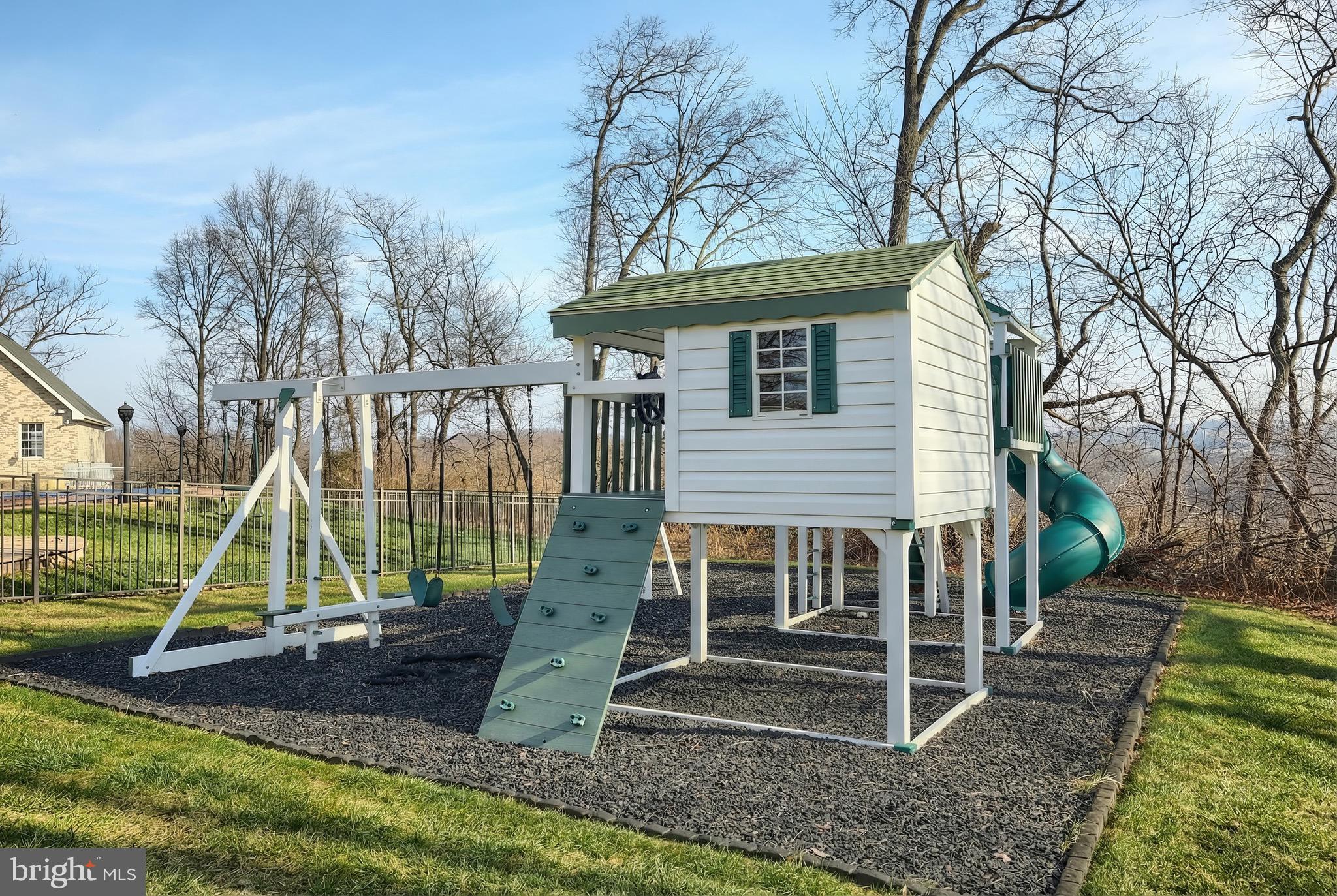 4440 Beards School Road Spring Grove, PA 17362 - Photo 53 of 66 a view of a house with a backyard and a slide
