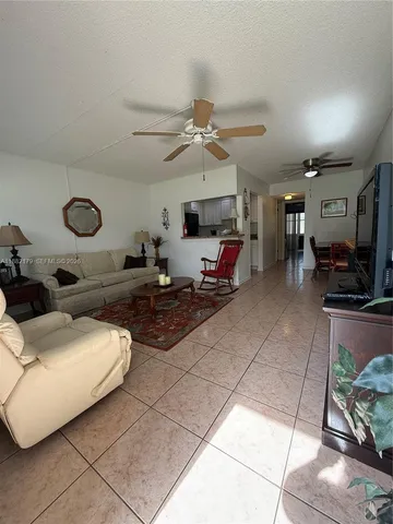 a bathroom with a toilet a sink and shower