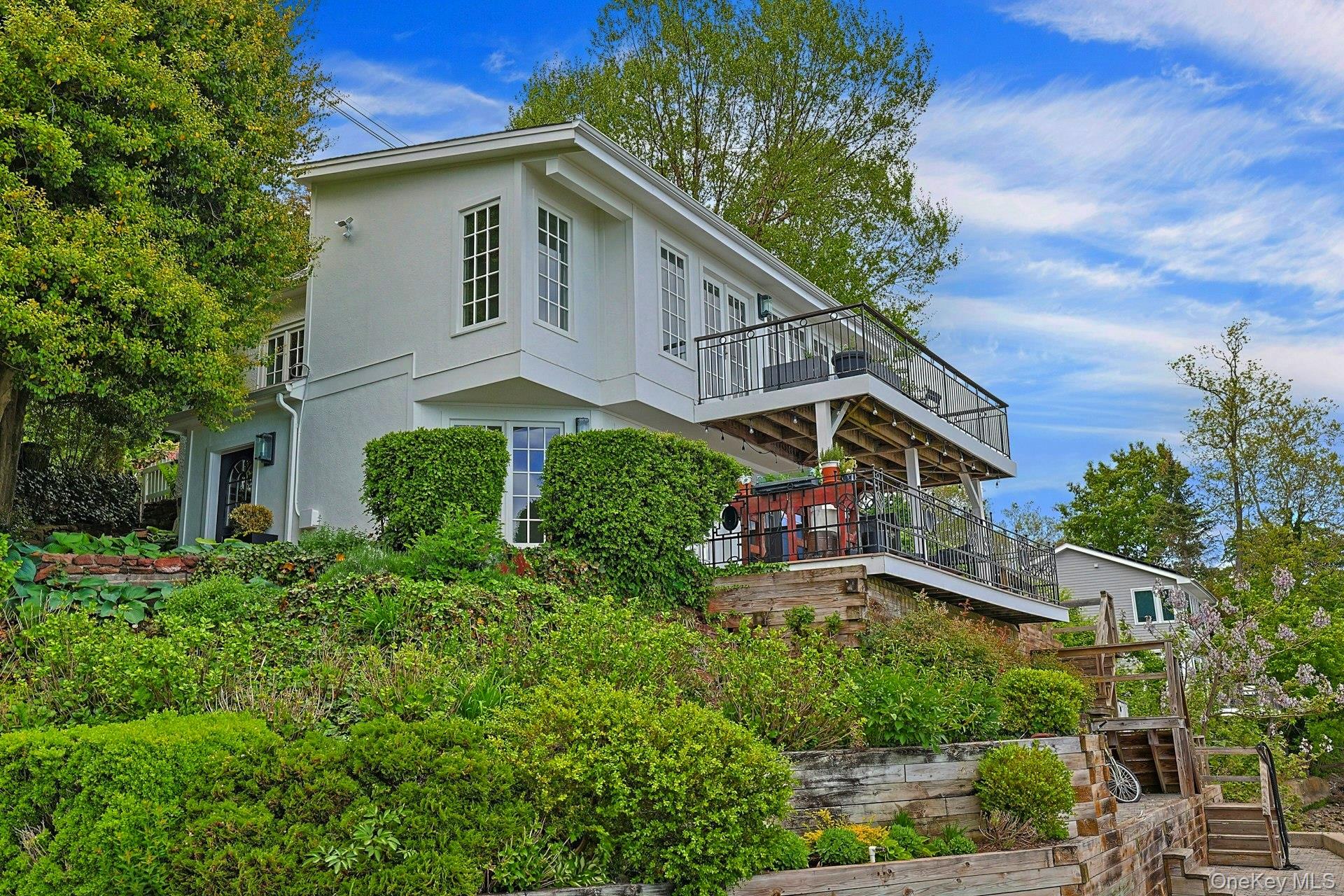 88 River Road Nyack, NY 10960 - Photo 12 of 49 a house view with a garden space
