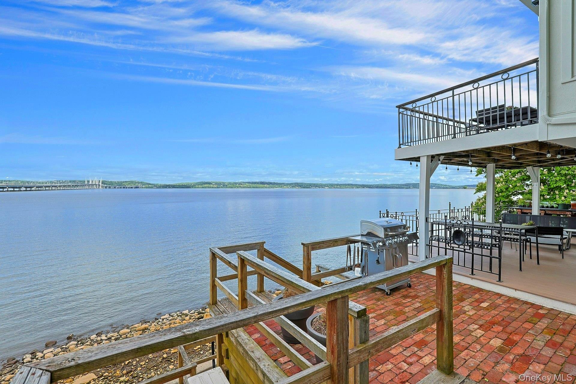 88 River Road Nyack, NY 10960 - Photo 16 of 49 a view of a roof deck with outdoor seating