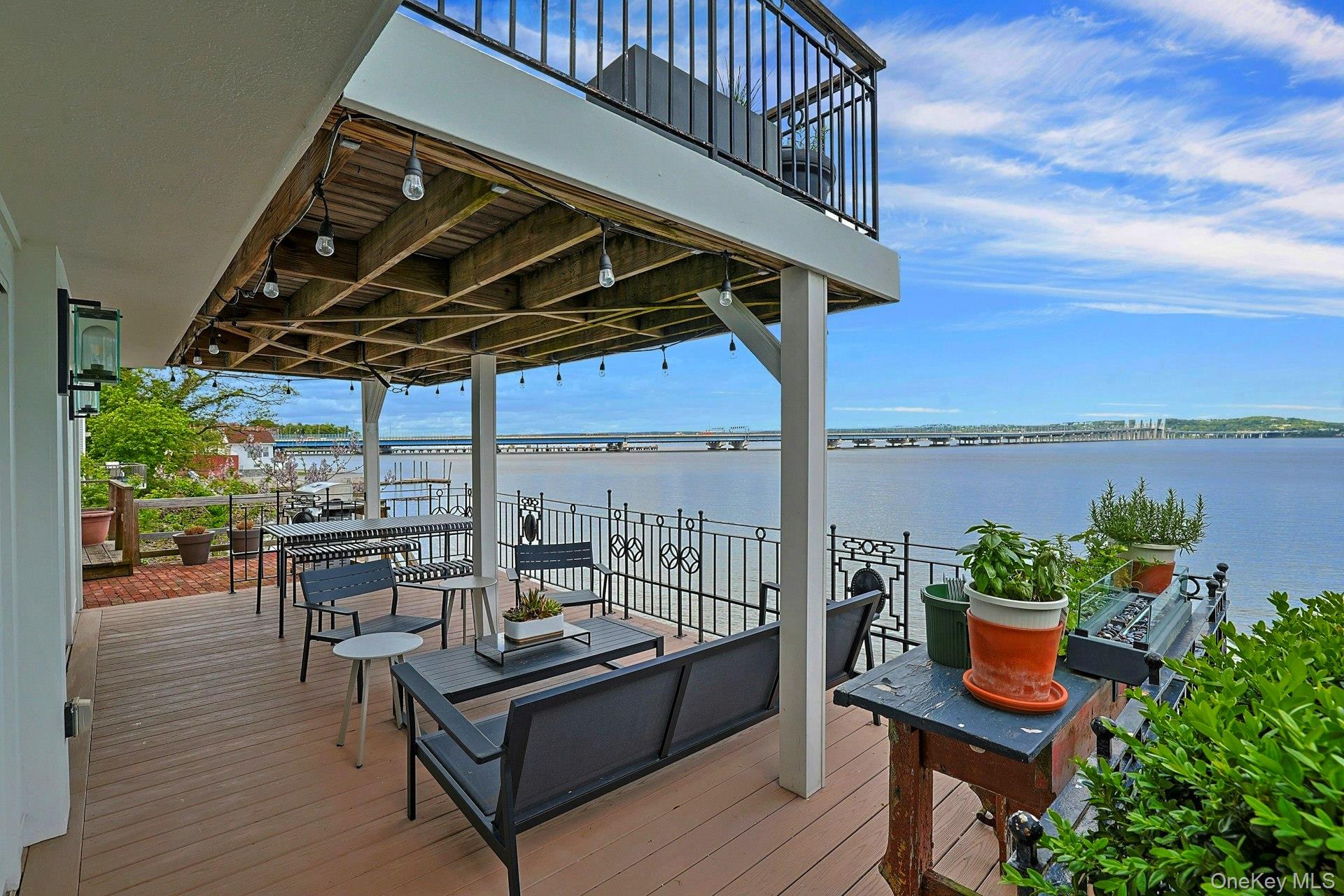 88 River Road Nyack, NY 10960 - Photo 18 of 49 a view of a terrace with furniture