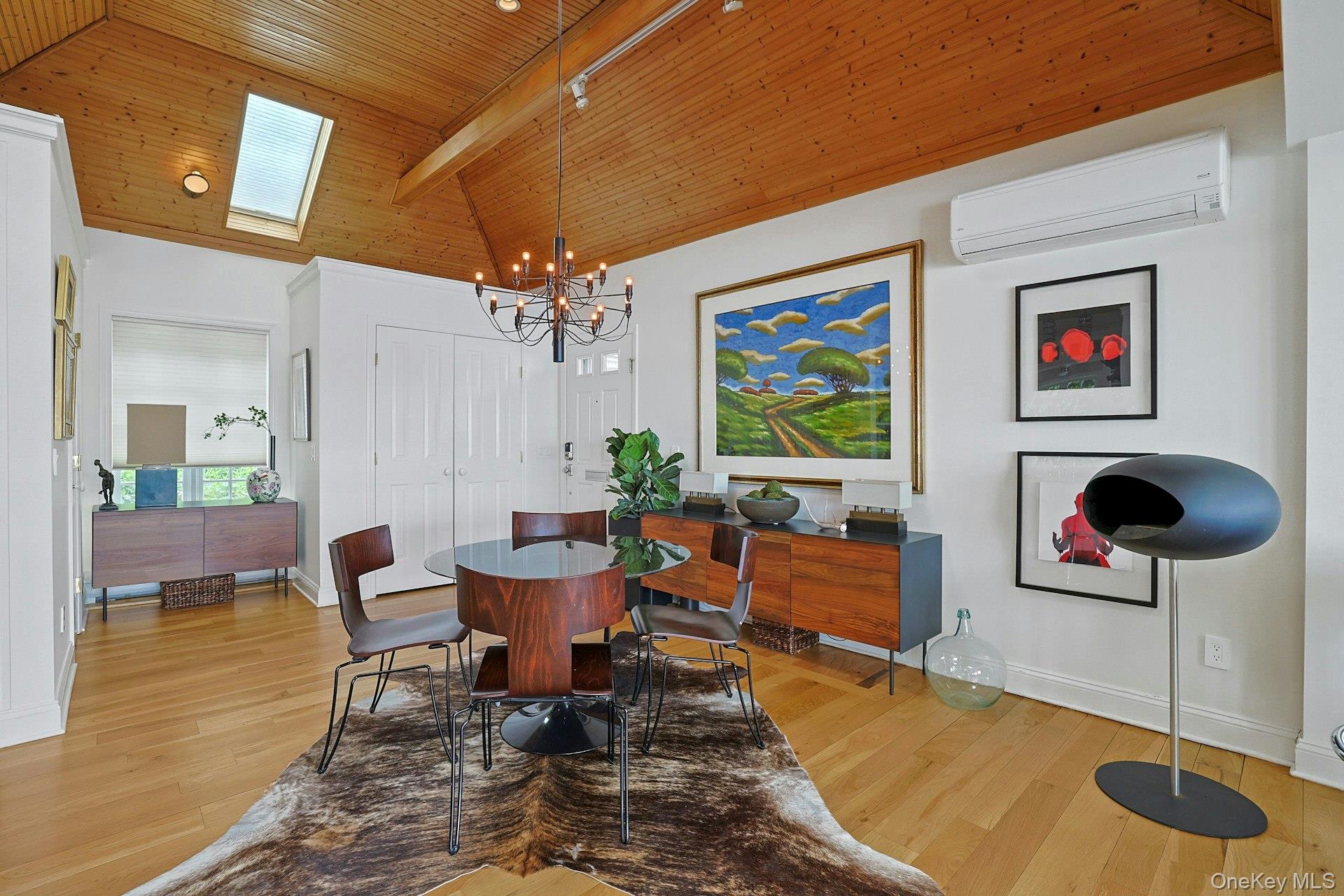 88 River Road Nyack, NY 10960 - Photo 21 of 49 a living room with furniture and a chandelier