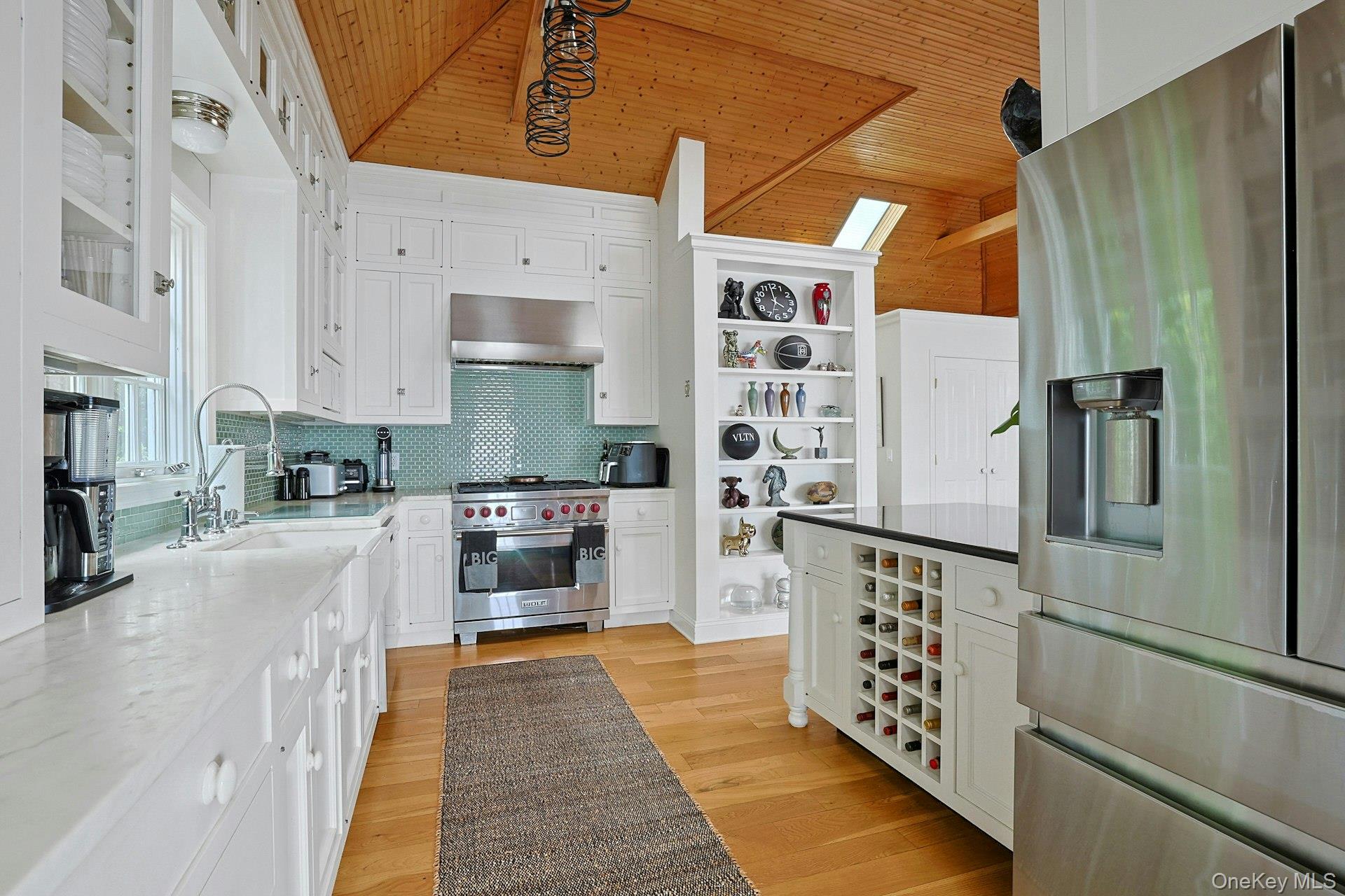 88 River Road Nyack, NY 10960 - Photo 25 of 49 a kitchen with stainless steel appliances a refrigerator and a stove