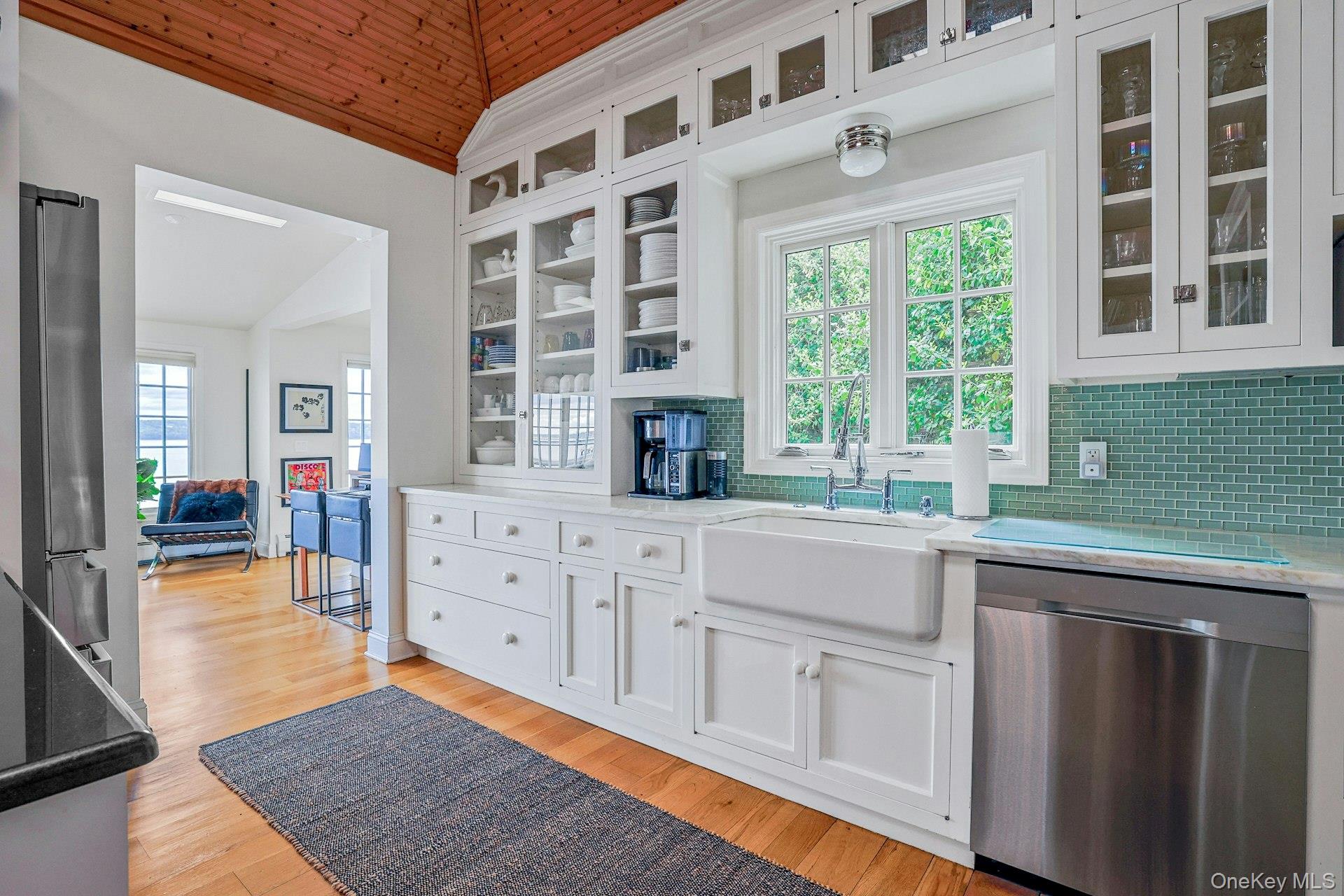 88 River Road Nyack, NY 10960 - Photo 26 of 49 a kitchen with stainless steel appliances granite countertop a stove a sink and a cabinets