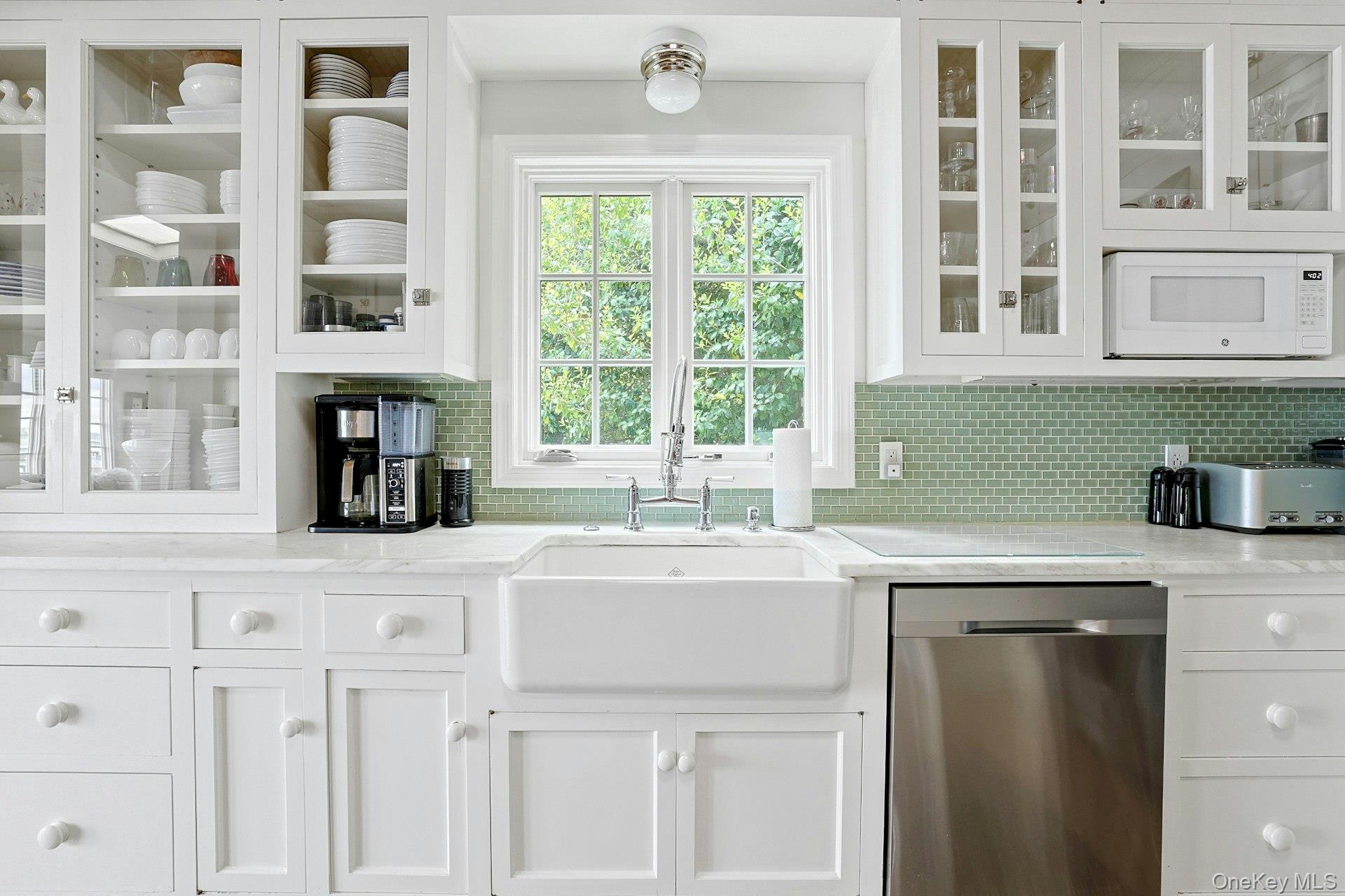 88 River Road Nyack, NY 10960 - Photo 27 of 49 a kitchen with granite countertop a sink and a window