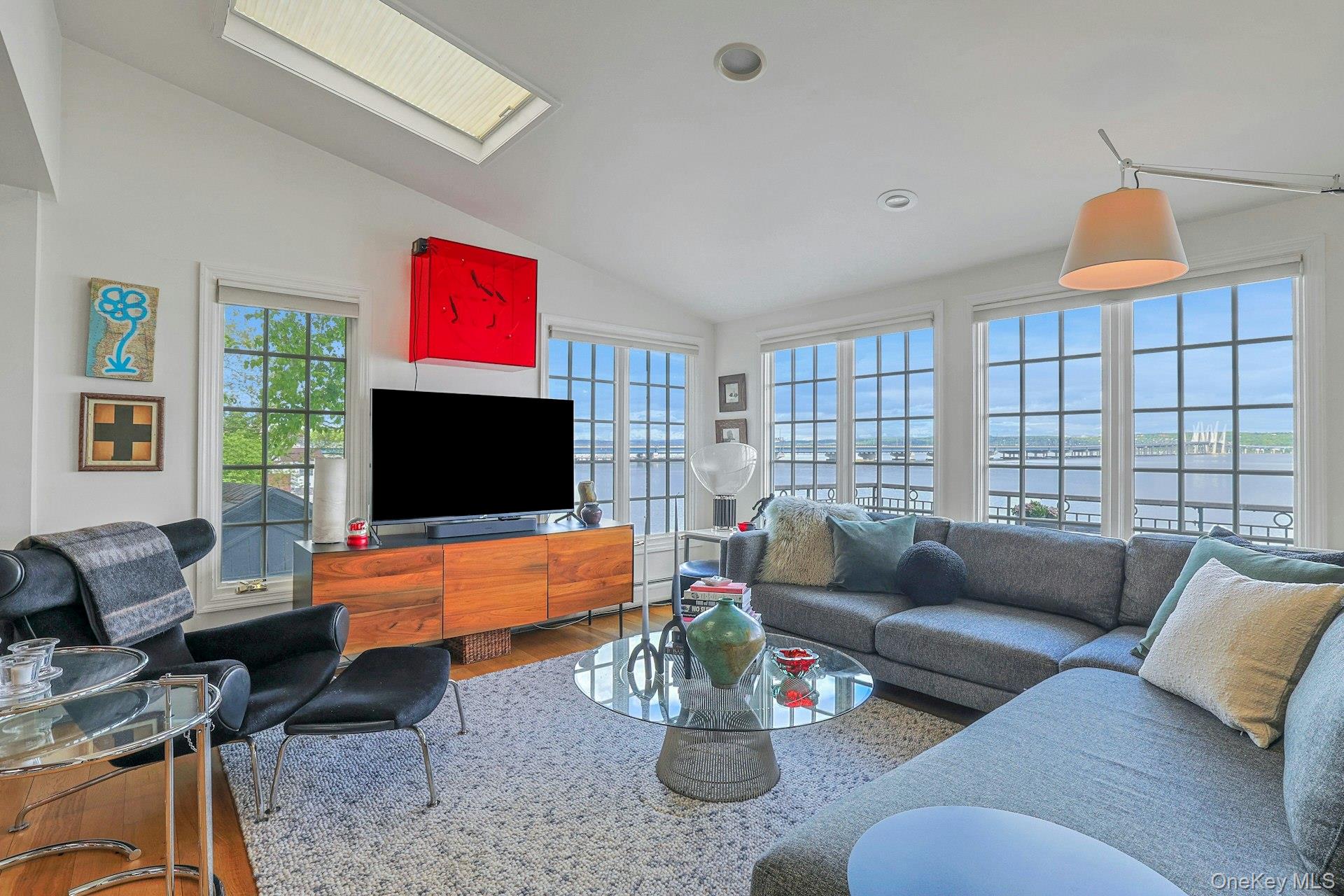 88 River Road Nyack, NY 10960 - Photo 30 of 49 a living room with furniture and a flat screen tv