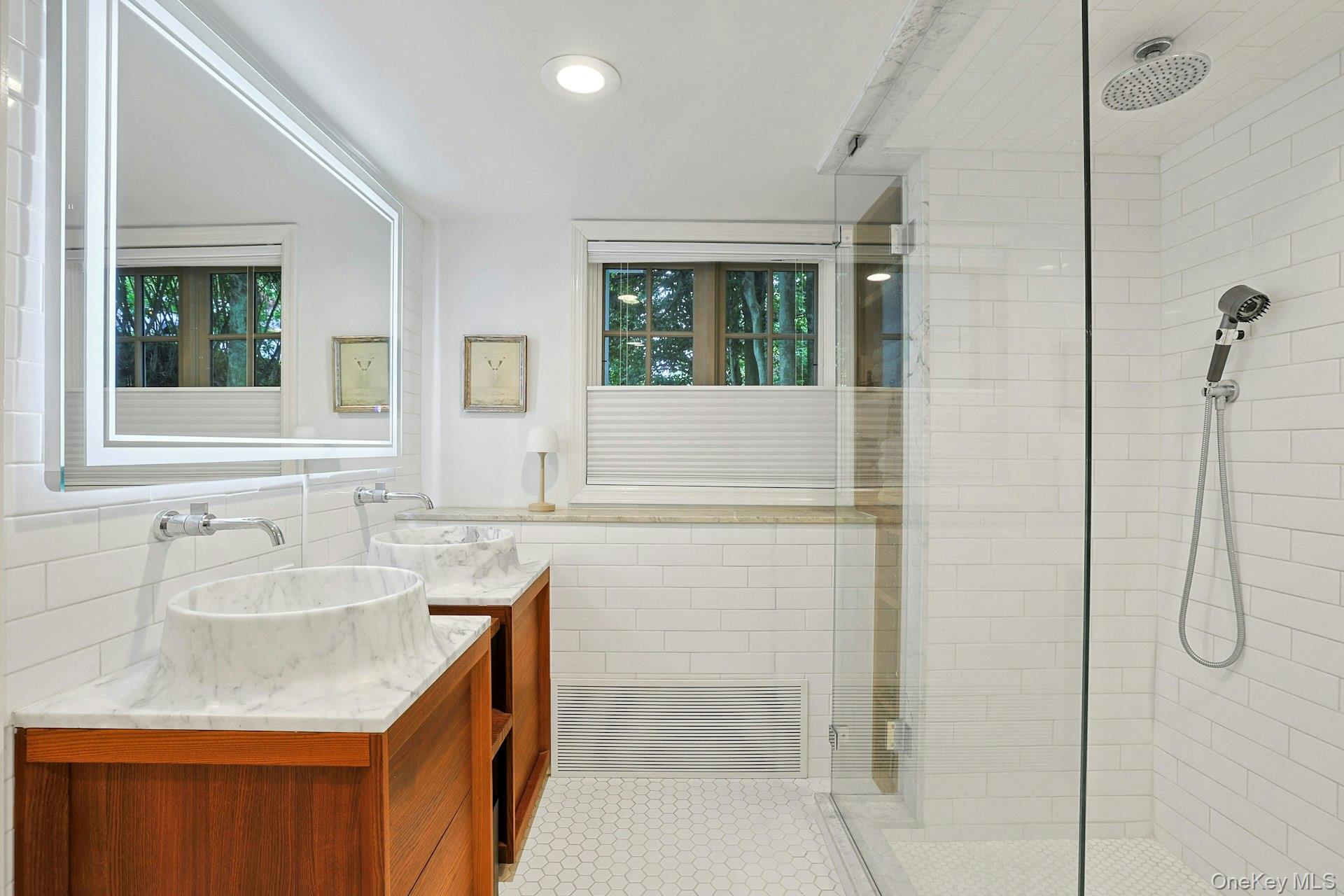 88 River Road Nyack, NY 10960 - Photo 40 of 49 a bathroom with a granite countertop sink a mirror and shower