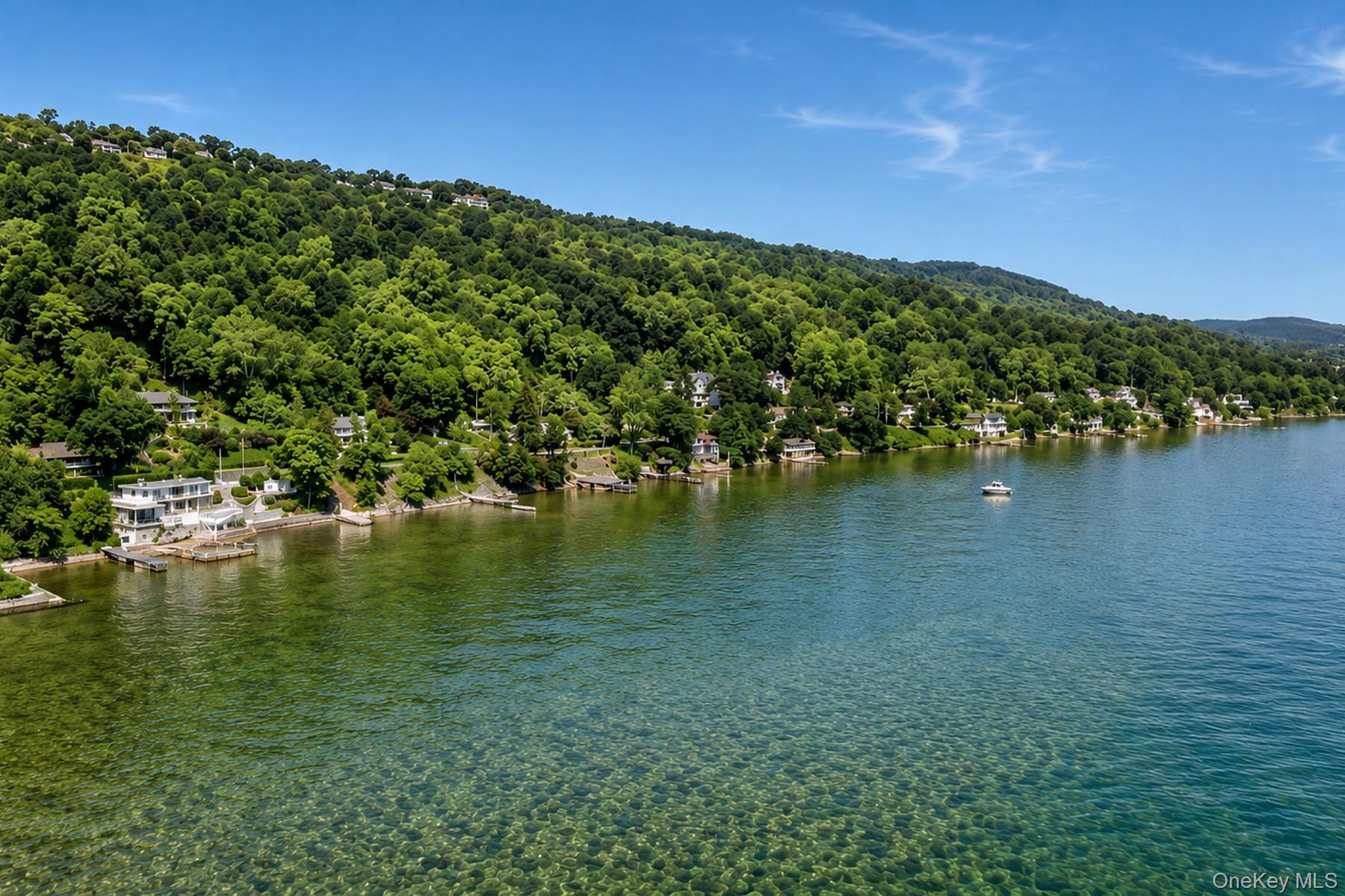 88 River Road Nyack, NY 10960 - Photo 44 of 49 a view of a large body of water with a building in the background