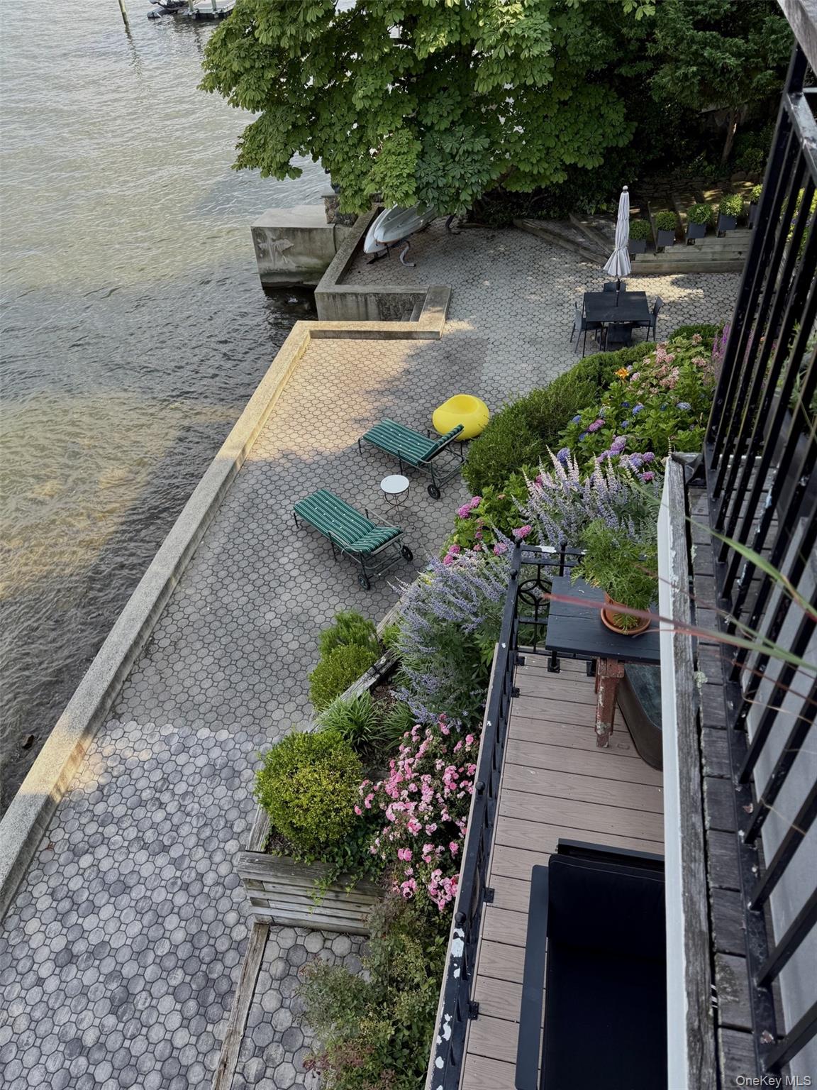 88 River Road Nyack, NY 10960 - Photo 46 of 49 a view of a backyard with sitting area