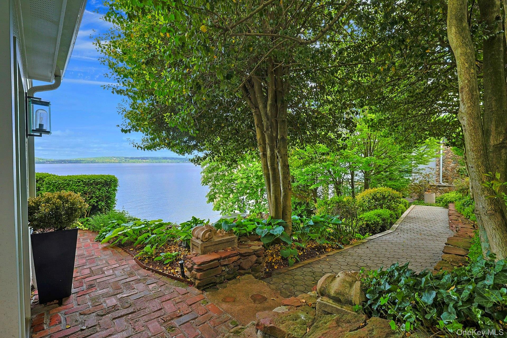 88 River Road Nyack, NY 10960 - Photo 5 of 49 a view of a garden with plants