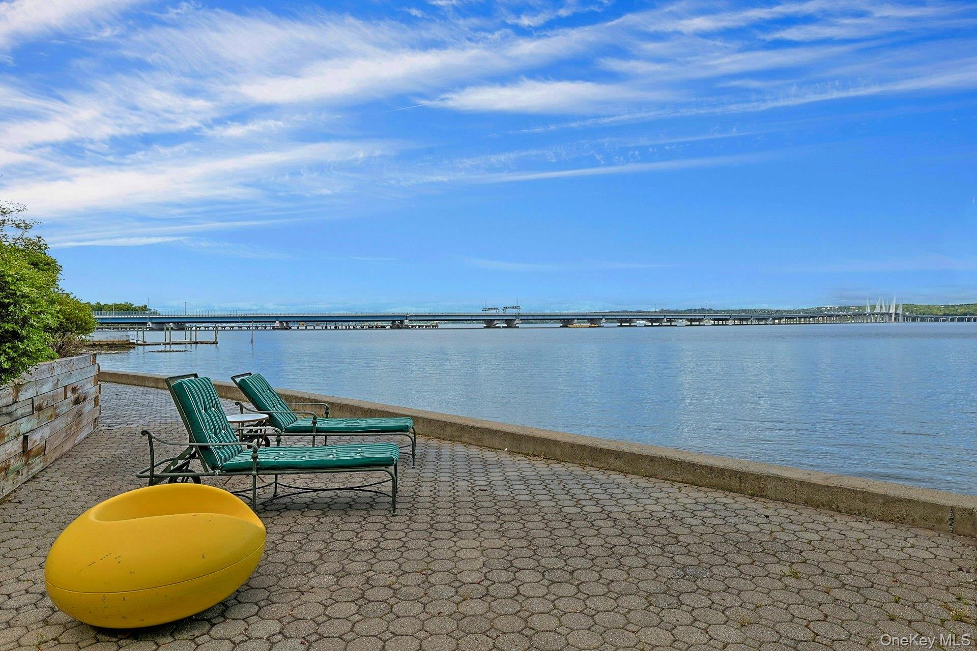 88 River Road Nyack, NY 10960 - Photo 9 of 49 a view of a lake in front of house with outdoor seating