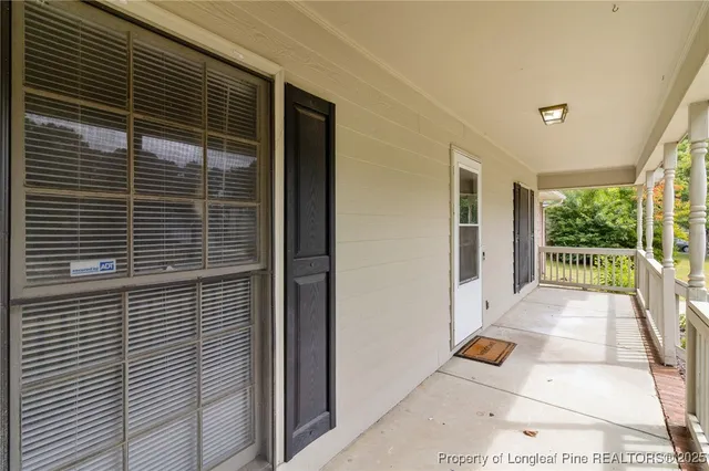 a view of backyard with a door