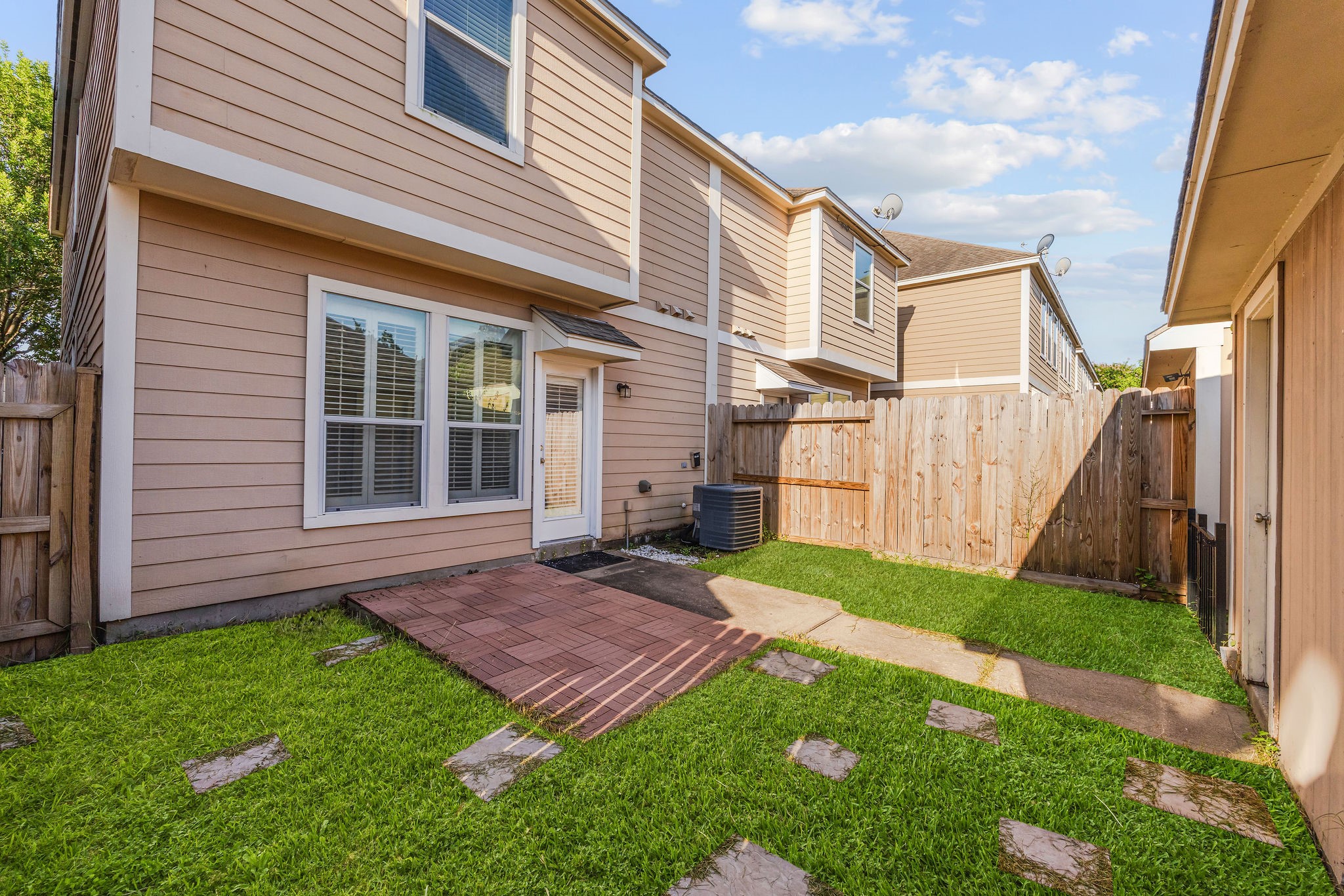 8018 Grow Lane Houston, TX 77040 - Photo 18 of 20 Low maintenance backyard with plenty space to hang out.