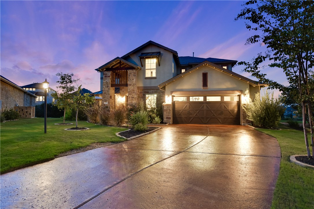 107 Edinburgh Isle Court Austin, TX 78738 - Photo 1 of 1 a front view of a house with a yard