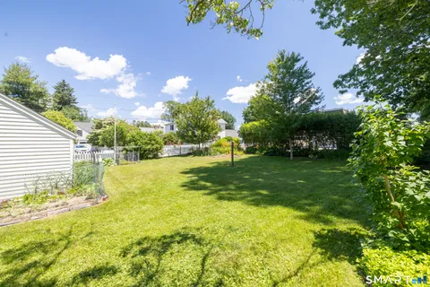a view of yard with swimming pool