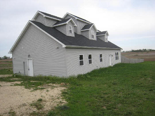 3366 Eddie Road Winnebago, IL 61088 - Photo 1 of 3 a view of a house with a yard