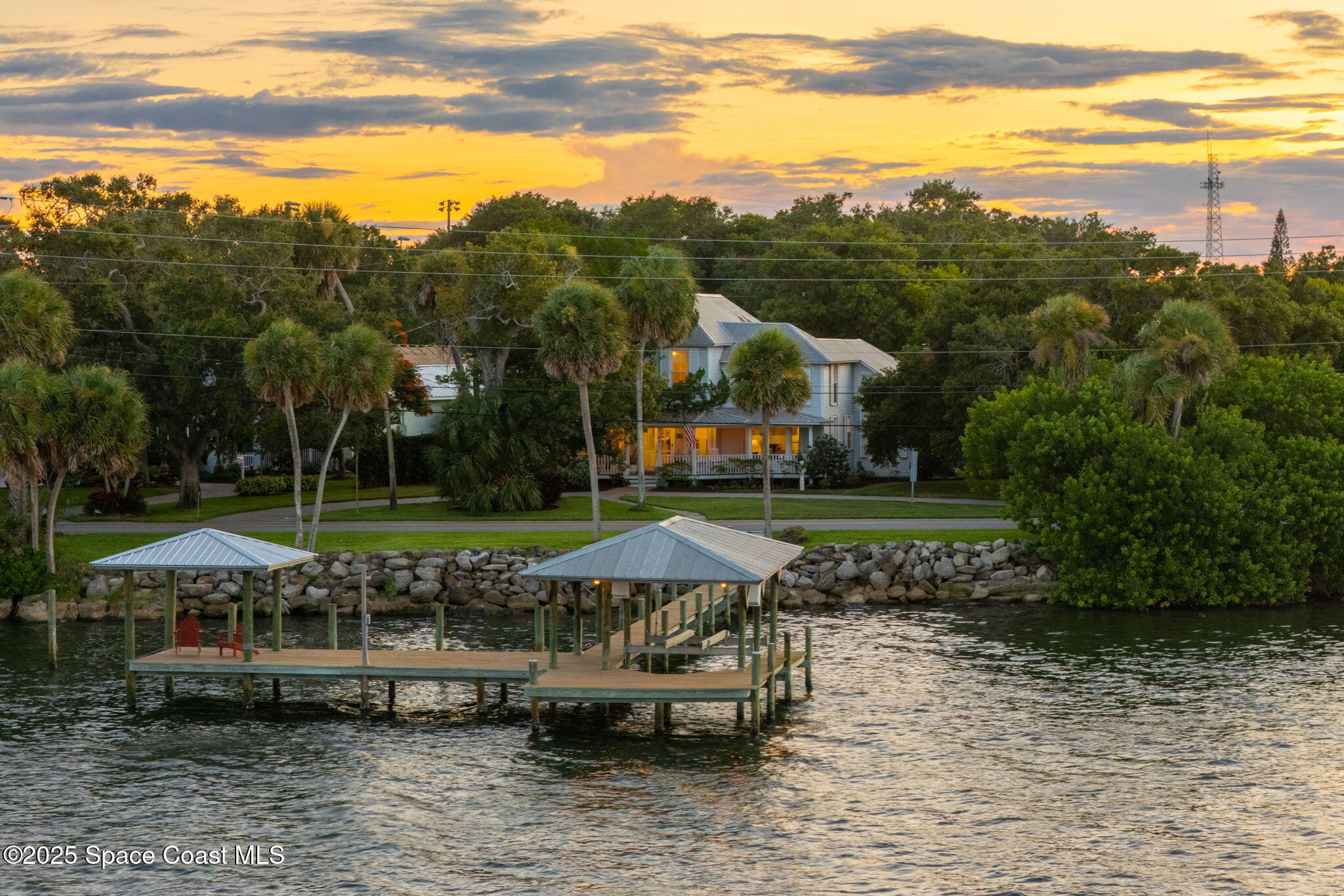 607 Rockledge Drive Rockledge, FL 32955 - Photo 1 of 91 a view of a lake with a garden