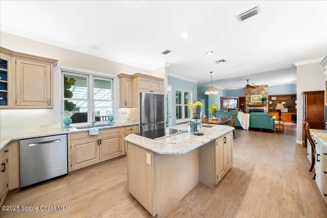 a bedroom with a bed and a table chair