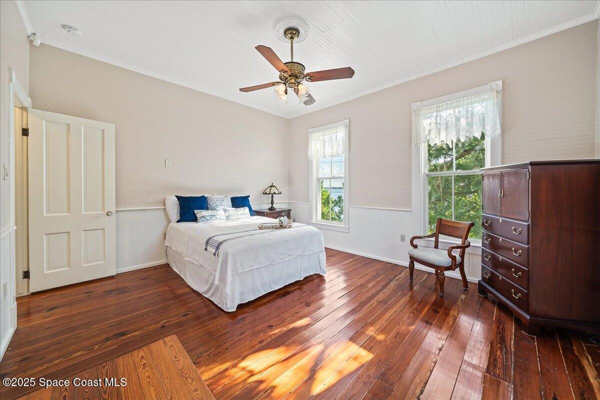 607 Rockledge Drive Rockledge, FL 32955 - Photo 39 of 91 a bedroom with a bed and a window