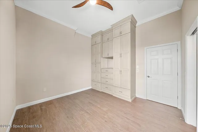 an aerial view of a residential houses with outdoor space