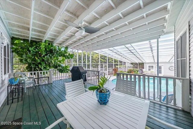 a front view of a house with a yard table and chairs