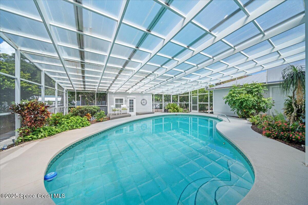 607 Rockledge Drive Rockledge, FL 32955 - Photo 50 of 91 a view of a house with a swimming pool