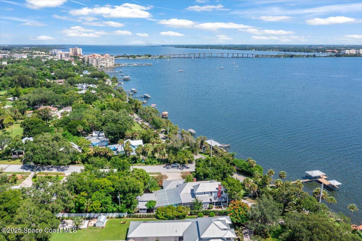 607 Rockledge Drive Rockledge, FL 32955 - Photo 80 of 91 a view of a lake with a city view