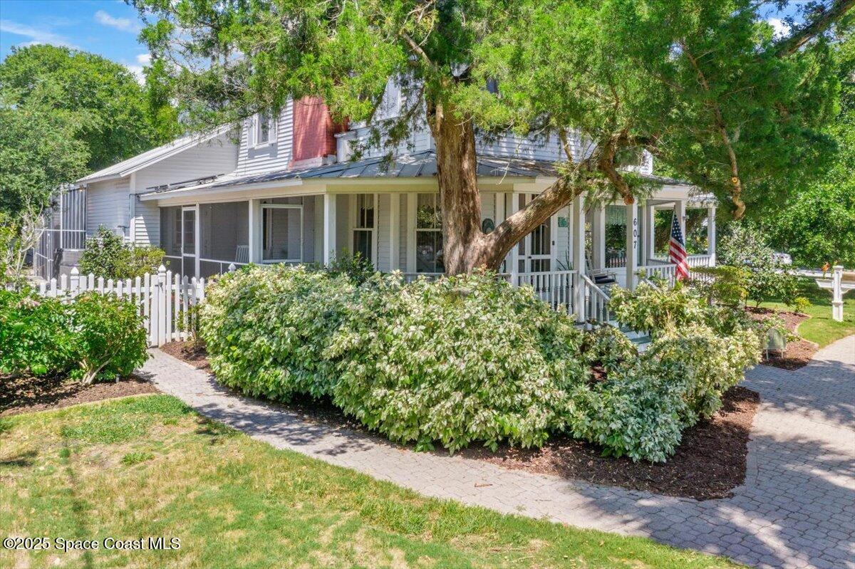 607 Rockledge Drive Rockledge, FL 32955 - Photo 89 of 91 a front view of a house with a yard