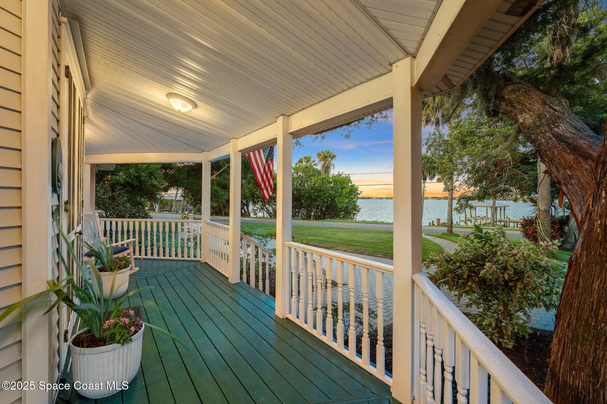 607 Rockledge Drive Rockledge, FL 32955 - Photo 9 of 91 a view of a porch with wooden floor