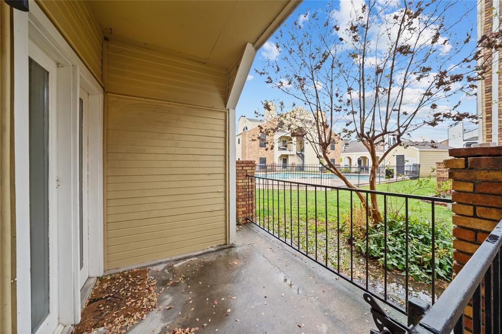 4434 Point Boulevard, Unit 108 Garland, TX 75043 - Photo 12 of 13 a view of a street from a balcony