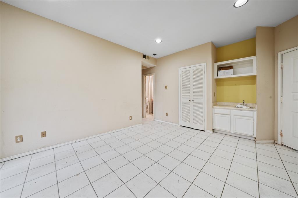 4434 Point Boulevard, Unit 108 Garland, TX 75043 - Photo 8 of 13 a view of an empty room