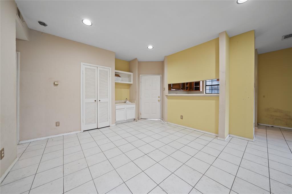 4434 Point Boulevard, Unit 108 Garland, TX 75043 - Photo 9 of 13 a view of a livingroom with wooden floor