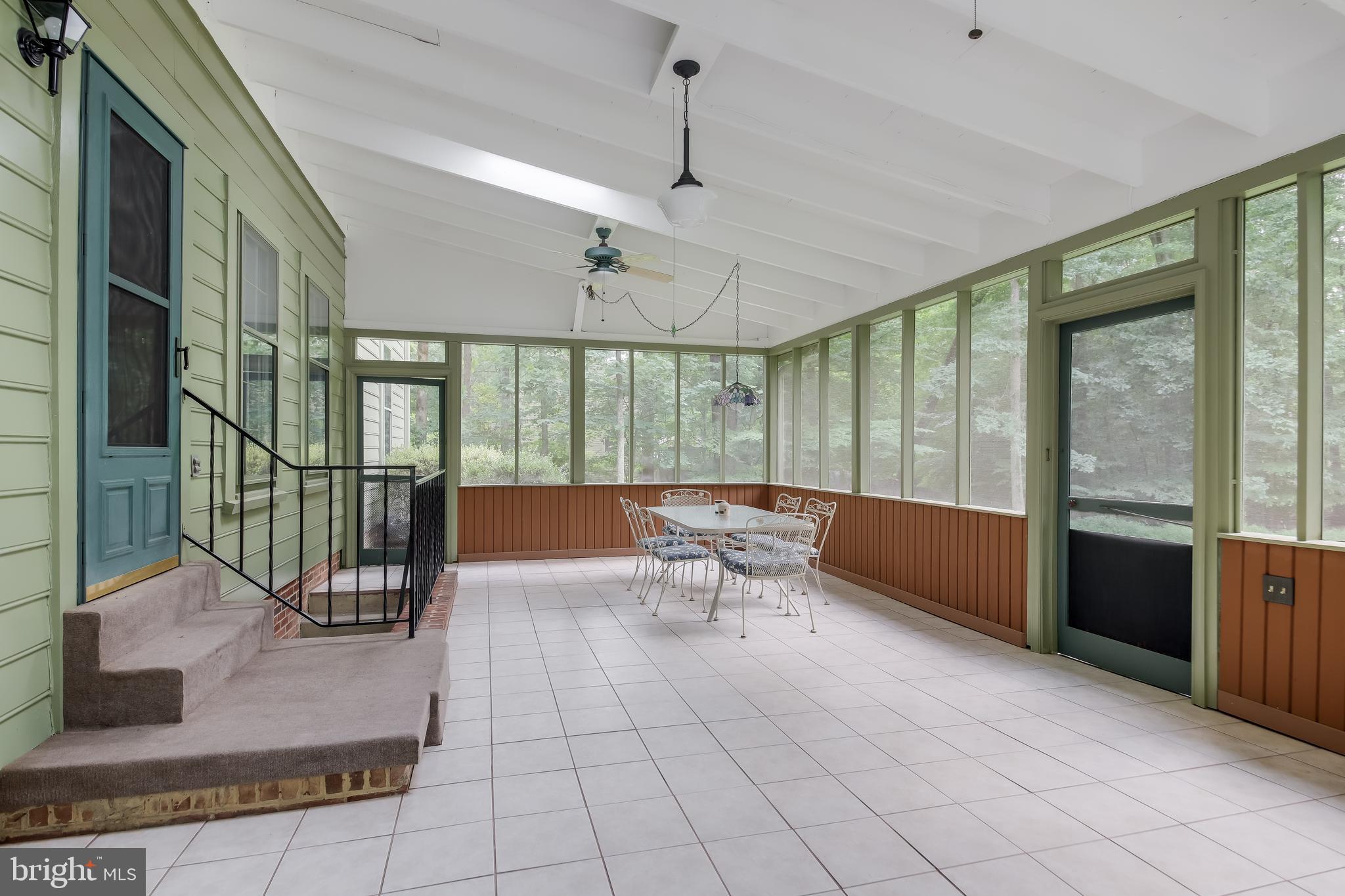8036 Stillbrooke Road Manassas, VA 20112 - Photo 34 of 41 Screened porch w/ ceramic tile flooring