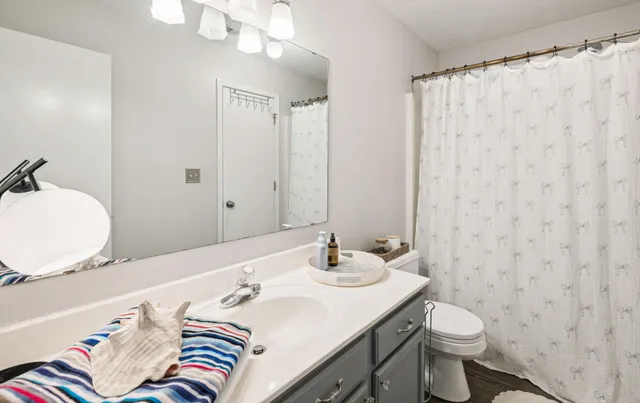 a view of a backyard with swimming pool