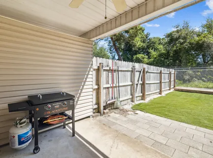 a view of backyard with green space