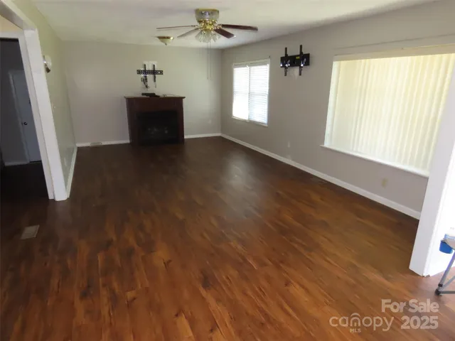 a view of livingroom with hardwood floor and window