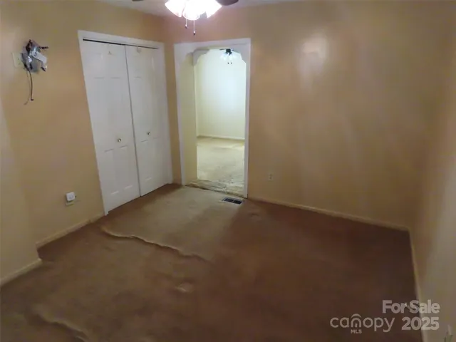 an empty room with an entryway
