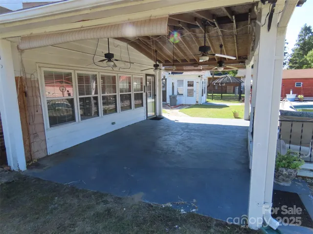 a view of a house with a swimming pool