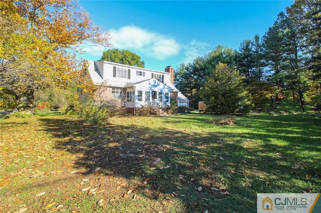 219 Lambertson Road Old Bridge, NJ 07747 - Photo 2 of 21 a view of a house with a big yard