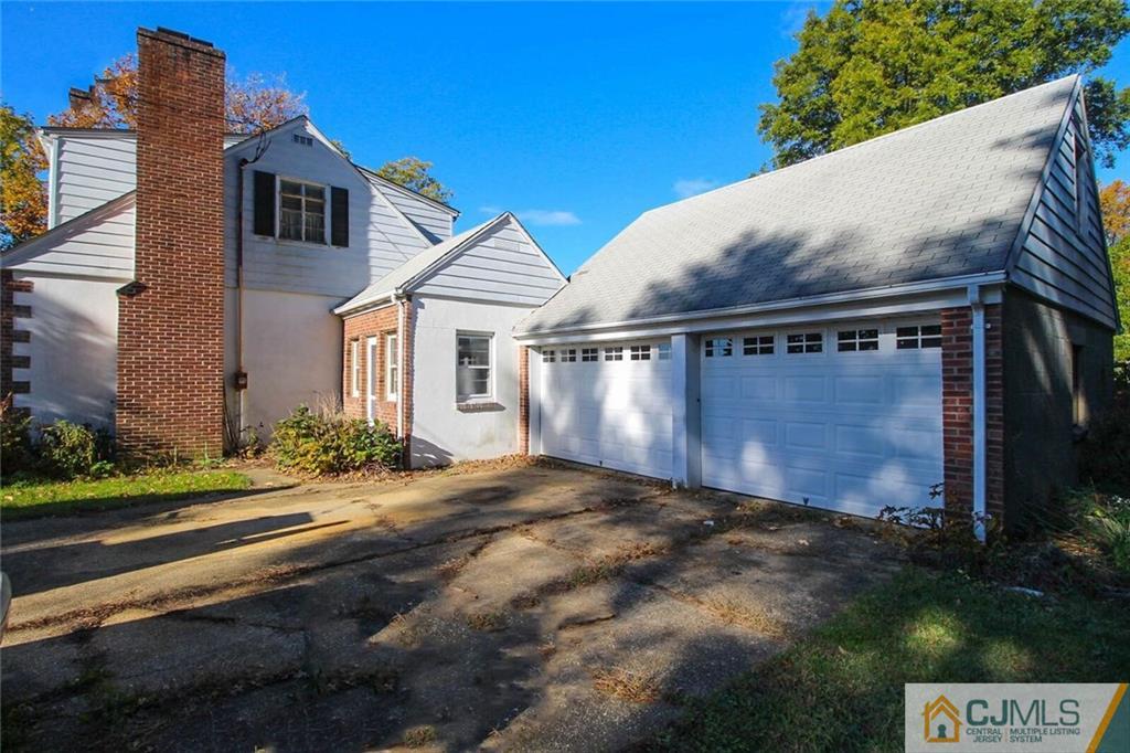 219 Lambertson Road Old Bridge, NJ 07747 - Photo 18 of 21 a view of a house with a yard