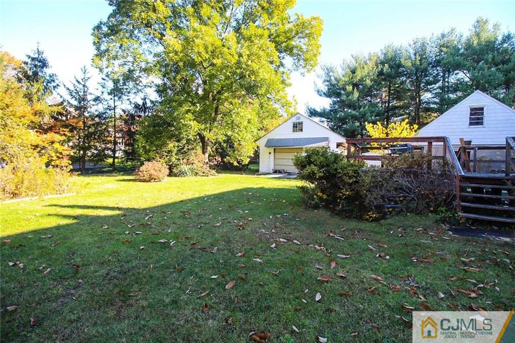 219 Lambertson Road Old Bridge, NJ 07747 - Photo 21 of 21 a view of a house with a yard