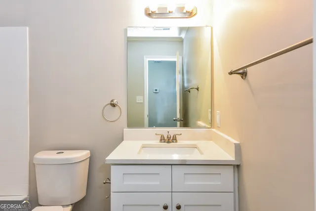 a bathroom with a sink and a toilet